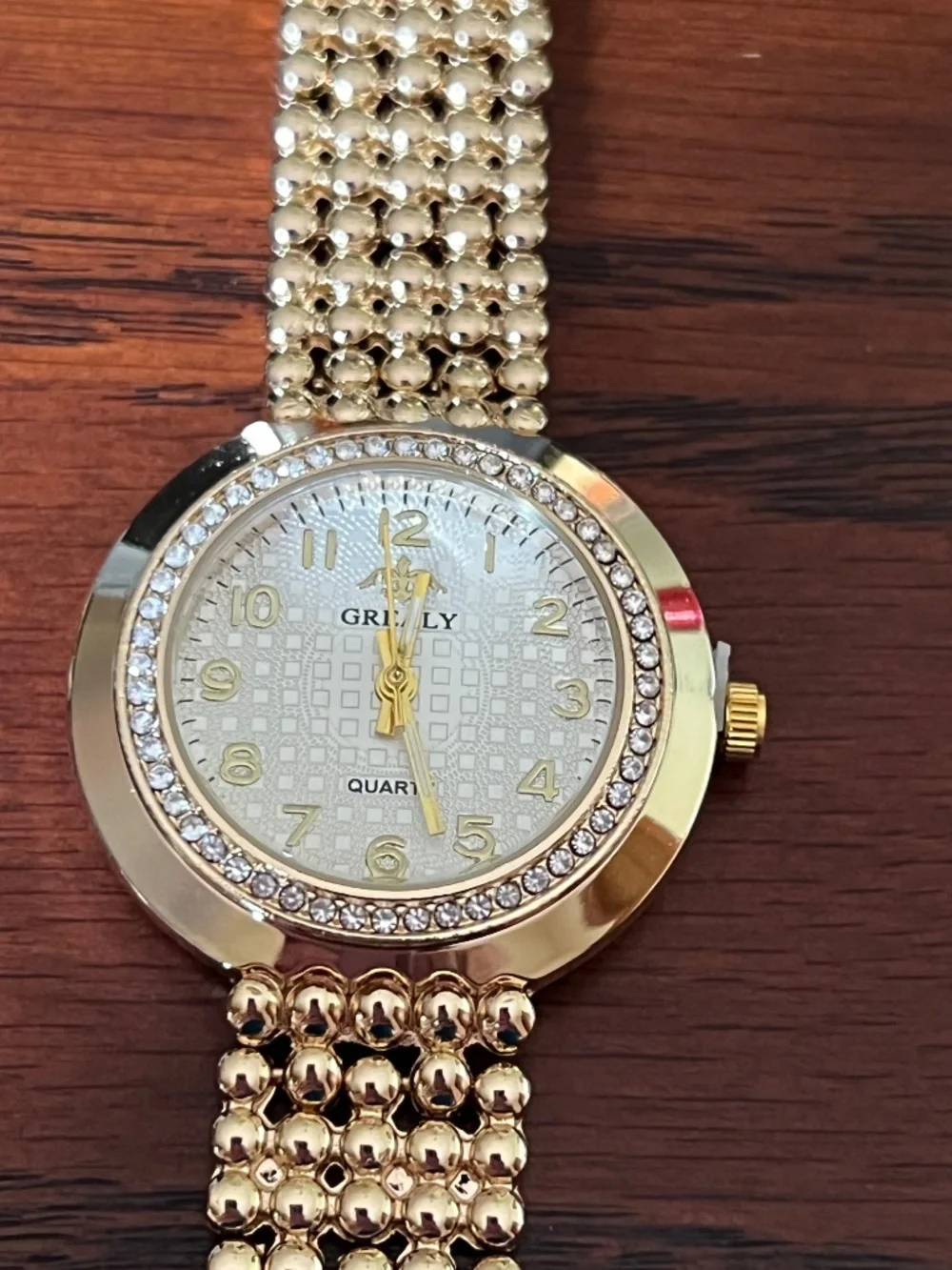 New Grealy ladies gold toned watch